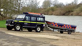 A SARA rescue boat on standby near the river