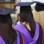 University graduates are suffering a 'double hit' of increased tuition fees and a freeze in pay