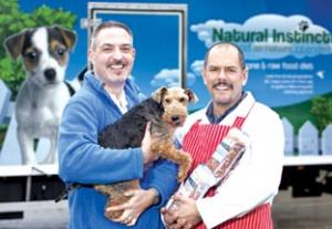 YUM: David Brock with his Welsh terrier Maggie and Michael McVay, of Natural Instinct.