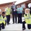 HAPPY: Thomas Vale contract manager Kevin Zamur with John Hickman, site manager; Alison Grennan, headteacher of St Luke’s Primary School in Wolverhampton,  and two of her pupils.