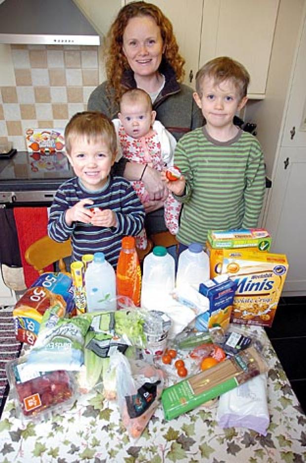 l Jennifer Lanham plans to use her own containers when shopping as part of her Plastic Free Shipston challenge. She is pictured with children Raphael, aged two, Athena, four months and Gabriel, four. 03jan11048.