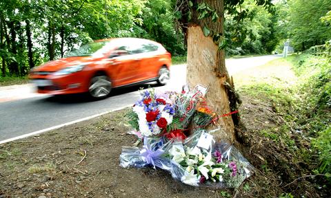 TRAGEDY: Floral tributes at the crash site (23058603)