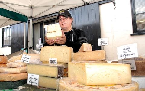 Davide Rinaldi on his cheese stall at the Italian market in Upton. 24062901. Picture by Nick Toogood.