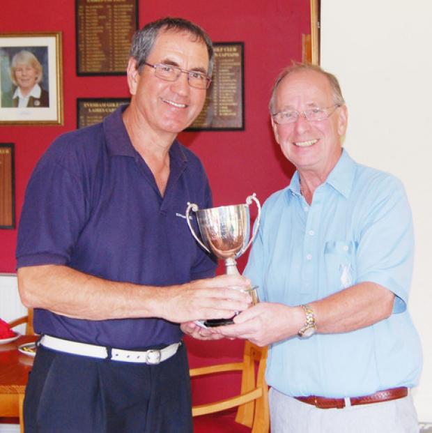 BEES KNEES: Evesham Golf Club’s Seniors captain Mike Abraham (right) presents the Diffin Trophy to Alan Bees.