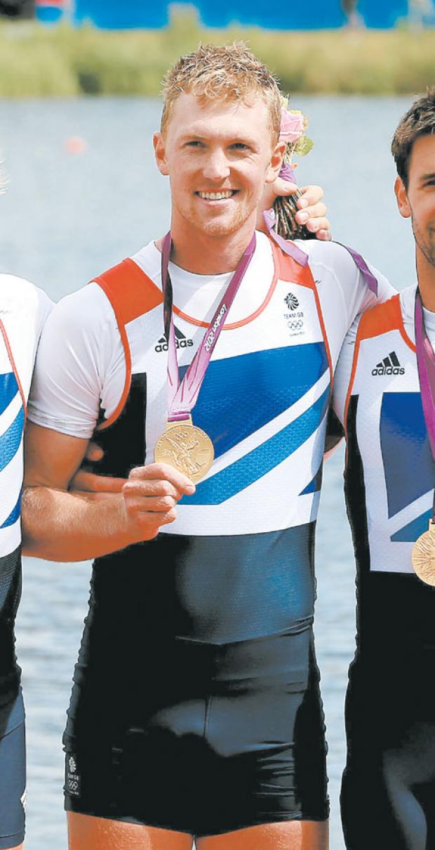 Tewkesbury Admag: olympic champion: Alex Gregory with his gold medal. Tewkesbury Admag: olympic champion: Alex Gregory with his gold medal.