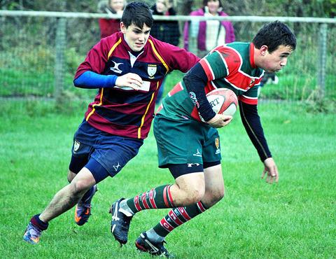CHALLENGE: Evesham under 17s player-of-the-match Henry Murray (left) about to make a tackle in his side’s 22-3 win over Aston Old Edwardians. Picture: GINO DI FRANCO