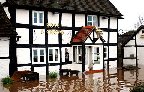Tewkesbury Admag: The Rose and Crown pub during last year's floods Tewkesbury Admag: The Rose and Crown pub during last year's floods