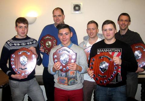 PROMOTION SUCCESS: Harvington award winners, back row (left to right): Simon Price (club captain), Andrew Fisher and Steve Mckelvie (collecting an award on behalf of Jo Venter). Front: Jethro Chadwick, Tom Heywood and Jaimen Rudd.