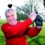 NEW Evesham Golf Club captain Geoff Insall shows off his swing during the traditional drive-in at the Fladbury course.