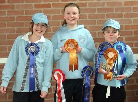 PRIZES: Croome Hunt Pony Club’s Kate Saunders, Emily Turner and Robert Saunders. Picture: SARA TURNER
