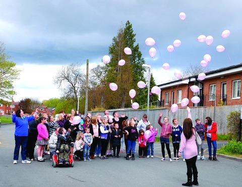 Tewkesbury Admag: TRIBUTE: Friends release pink balloons in memory of Katie Webb. Tewkesbury Admag: TRIBUTE: Friends release pink balloons in memory of Katie Webb.