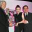 HITTING THE BIG TIME: Cher Lloyd picks up her award.