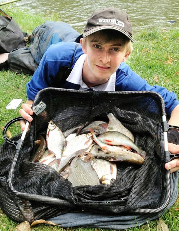 TOP CATCH: Evesham’s Joe Skinner shows off his winning net. Picture: TOM SCHOLEY