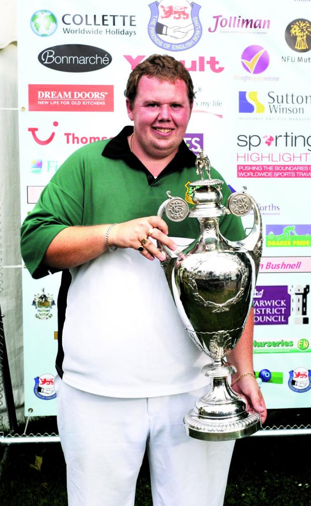 Tewkesbury Admag: NATIONAL TRIUMPH: Broadway’s Andrew Walters with his Bowls England trophy. Picture: ALISTAIR HOLLIS Tewkesbury Admag: NATIONAL TRIUMPH: Broadway’s Andrew Walters with his Bowls England trophy. Picture: ALISTAIR HOLLIS
