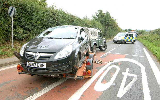 Car ends up on its side after Lower Broadheath crash