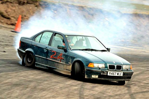 BEHIND THE WHEEL: Ben Fisher competes in drifting at Birmingham Wheels. Picture: TAIL-OUT PHOTOGRAPHY