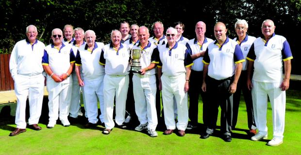 TROPHY TIME: The winning Broadway team with the Vernon Turner Cup after they beat Oldlington from Kidderminster 83-78. Picture: DAVID HILL