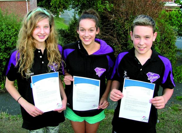 TOP TALENT: Vale swimmers (left to right) Tazmin Pugh, Chloe Golding and Tyler McLean with their England talent programme invitation letters. Picture: IAN PUGH.