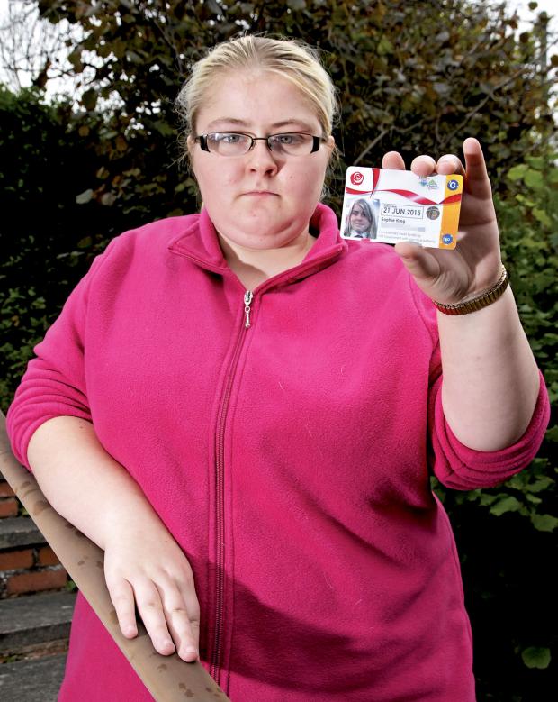 DISPUTE: Sophie King with the pass at the centre of the confusion and the cause of her mother’s anger. 3713402003