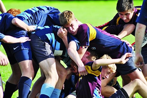 HARD WORK: Josh Hartland, Kieran Raymer and Marcus Harris from Evesham under 15s.