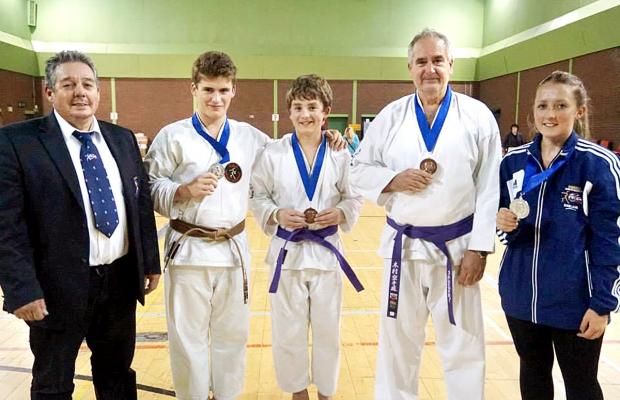 HONOURS GALORE: Kimura Shukokai Club medal winners (from left): Sensi Steve Farrow, Sam Waller, Ben Graves, Dave Graves and Josie Farrow.