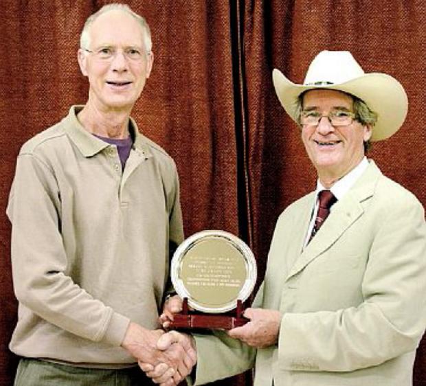 Clive Haynes receiving his award