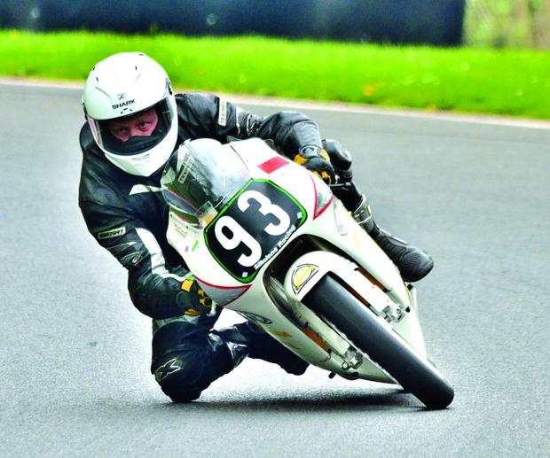 Tewkesbury Admag: EYES ON THE PRIZE: A focused Mark Tyrrell celebrated season-ending success by winning the Darley Moor GP125 Championship and finished second in the lightweight championship. Picture: SUE CHAPMAN. Tewkesbury Admag: EYES ON THE PRIZE: A focused Mark Tyrrell celebrated season-ending success by winning the Darley Moor GP125 Championship and finished second in the lightweight championship. Picture: SUE CHAPMAN.