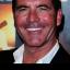 Simon Cowell commented on Russell Brand's political opinions