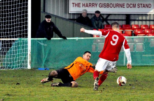 Tewkesbury Admag: READY TO STRIKE: Littleton’s Jamie Clarke rounds the goalkeeper to score during his side’s 3-0 victory over Lichfield City in the St Mary’s Hospice Midland Football Combination Premier Division. Picture: MICHAEL PITTS Tewkesbury Admag: READY TO STRIKE: Littleton’s Jamie Clarke rounds the goalkeeper to score during his side’s 3-0 victory over Lichfield City in the St Mary’s Hospice Midland Football Combination Premier Division. Picture: MICHAEL PITTS