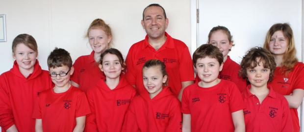 Tewkesbury Admag: COVENTRY TRAINING: Evesham Swimming Club youngsters, back row (left to right): Rachel Egan, Martha Bailey, Andy Mabbet (acting head coach), Georgie Banton and Amy Cooper. Front: Oliver Foster, Sophie Pettit, Mollie Cresswell, Kieran Cooper and Sam Parker. Tewkesbury Admag: COVENTRY TRAINING: Evesham Swimming Club youngsters, back row (left to right): Rachel Egan, Martha Bailey, Andy Mabbet (acting head coach), Georgie Banton and Amy Cooper. Front: Oliver Foster, Sophie Pettit, Mollie Cresswell, Kieran Cooper and Sam Parker.