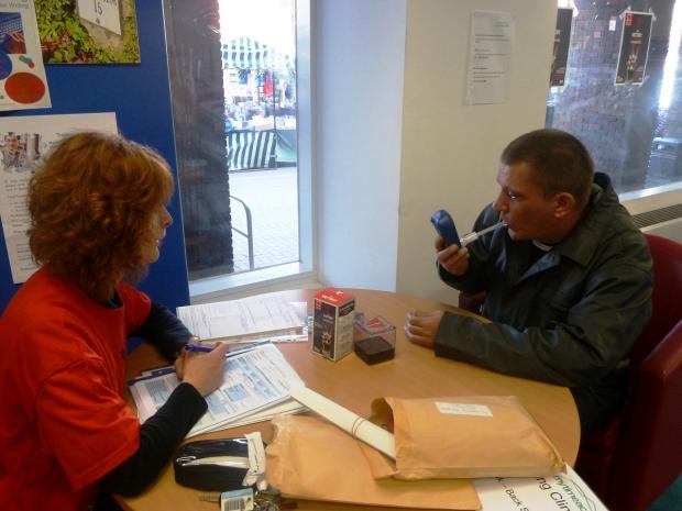 Tewkesbury Admag: An adviser from Mytime Active advises a man on quitting smoking Tewkesbury Admag: An adviser from Mytime Active advises a man on quitting smoking