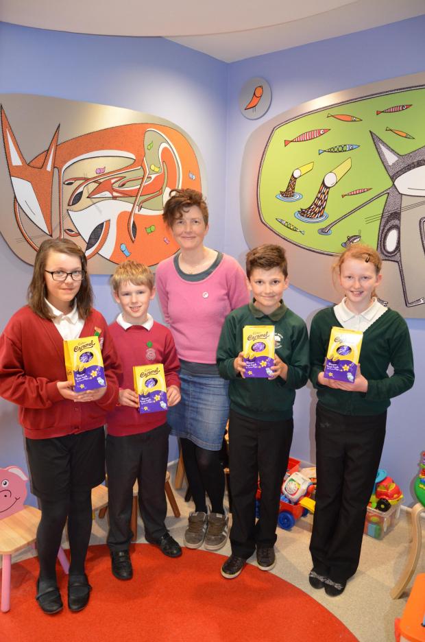 Tewkesbury Admag: Artist Imogen Harvey Lewis (centre) with pupils (from l-r) Anna Bowes, William Gosden, Lewis Danter and Bailey Durn Tewkesbury Admag: Artist Imogen Harvey Lewis (centre) with pupils (from l-r) Anna Bowes, William Gosden, Lewis Danter and Bailey Durn