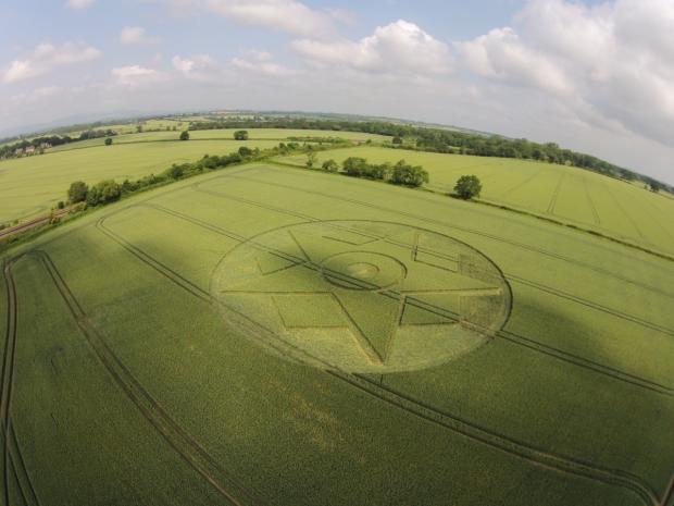 Tewkesbury Admag: The crop circle has appeared in a field near Pershore, photographed by Nigel Pritchett. Tewkesbury Admag: The crop circle has appeared in a field near Pershore, photographed by Nigel Pritchett.