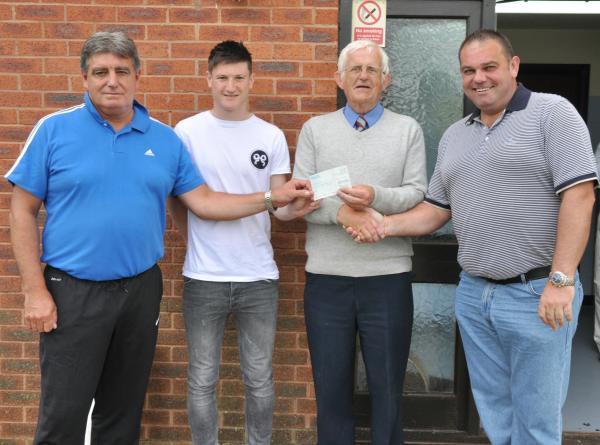 Tewkesbury Admag: From left: Andy Robbins (Littleton manager), Joe Lolley, Colin Emms (Littleton chairman) and Ken Rae (Kidderminster chairman). Emms received a cheque from Rae as a donation for developing Lolley, who Harriers sold to Huddersfield. Picture: MICHAEL PITTS Tewkesbury Admag: From left: Andy Robbins (Littleton manager), Joe Lolley, Colin Emms (Littleton chairman) and Ken Rae (Kidderminster chairman). Emms received a cheque from Rae as a donation for developing Lolley, who Harriers sold to Huddersfield. Picture: MICHAEL PITTS