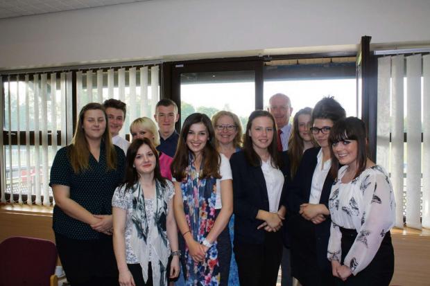 Tewkesbury Admag: Members of Worcestershire Health and Care NHS Trust's youth board celebrate their first anniversary with chief executive Sarah Dugan and chairman Chris Burdon Tewkesbury Admag: Members of Worcestershire Health and Care NHS Trust's youth board celebrate their first anniversary with chief executive Sarah Dugan and chairman Chris Burdon