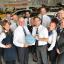 Tewkesbury Admag: THIRTY YEARS: Pete Brampton (wearing glasses) with his colleagues from Bristol Street Motors Worcester Tewkesbury Admag: THIRTY YEARS: Pete Brampton (wearing glasses) with his colleagues from Bristol Street Motors Worcester