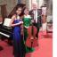Tewkesbury Admag: Francis Grier with daughters Savitri, on violin, and Indira, on 'cello, in St Peter's church, Inkberrow which hosted the concert. Tewkesbury Admag: Francis Grier with daughters Savitri, on violin, and Indira, on 'cello, in St Peter's church, Inkberrow which hosted the concert.